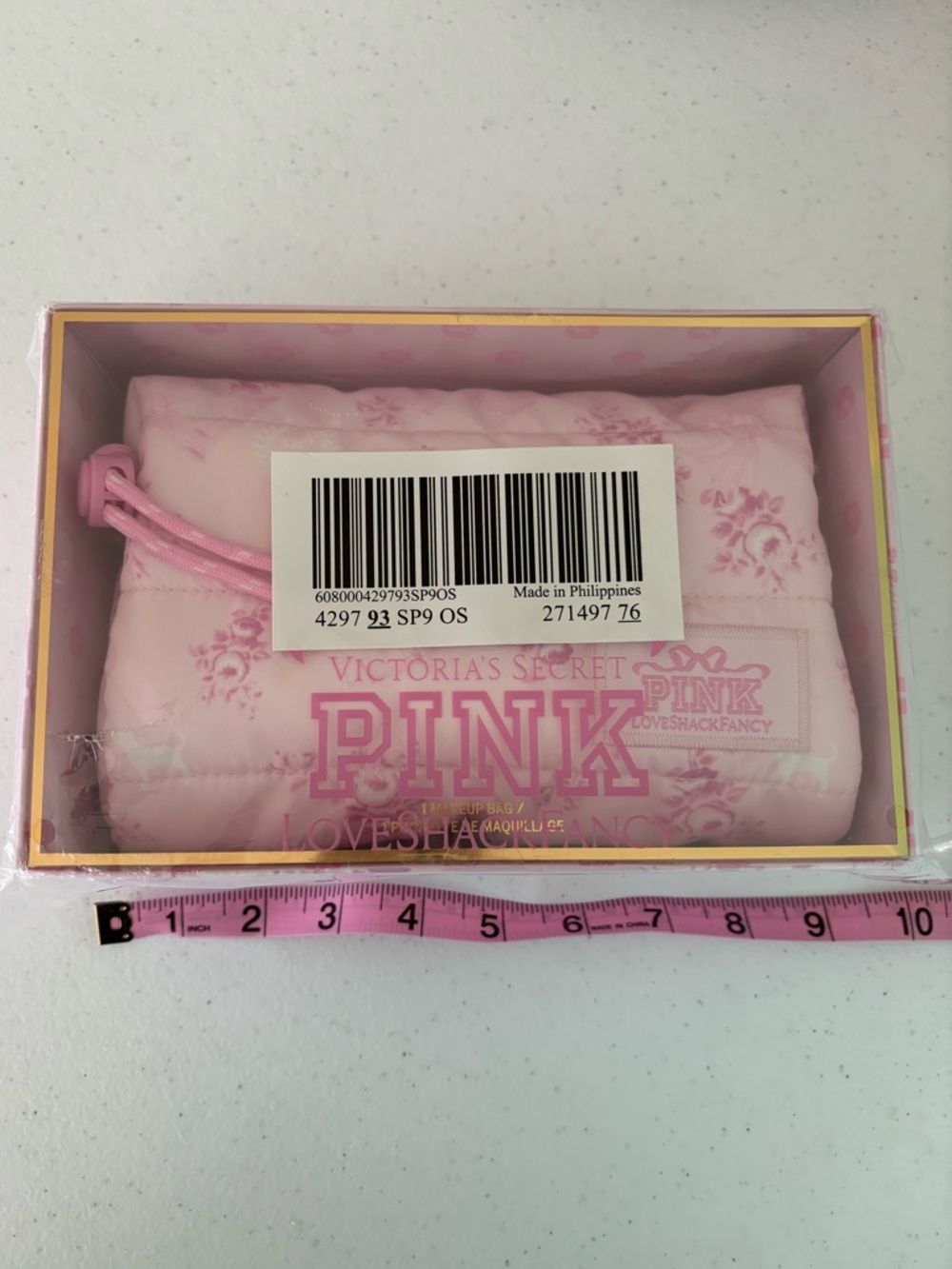 Pink Victoria secret
LoveShackFancy Makeup Bag